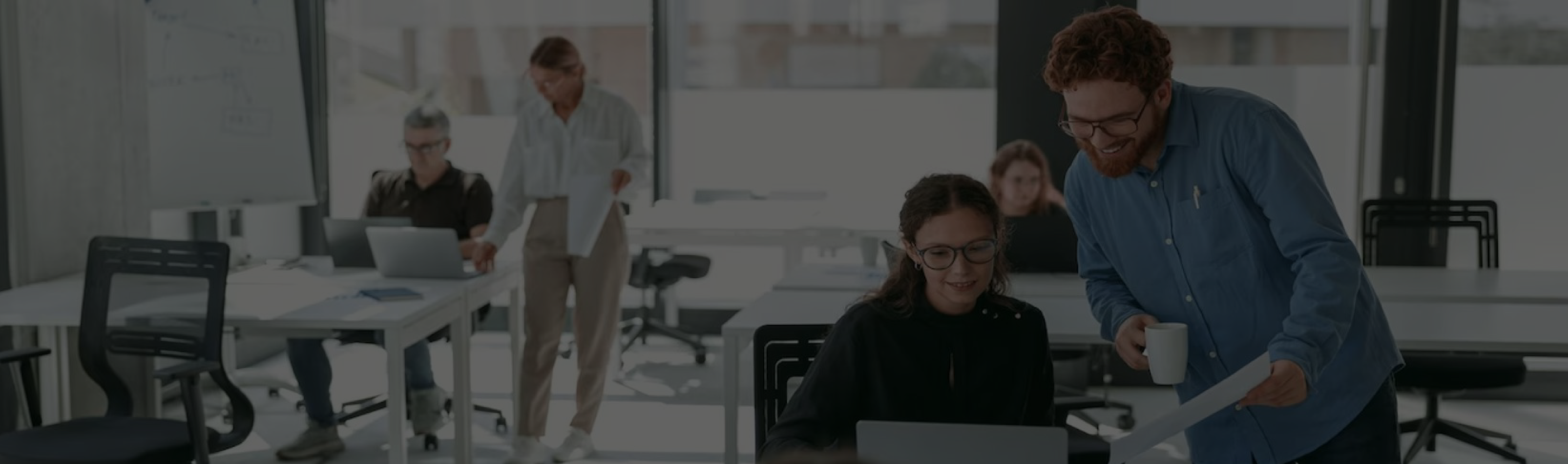 Business meeting with people discussing property map on a wall